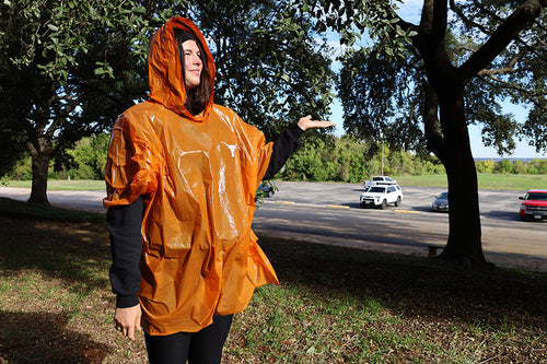 Burnt Orange Poncho with White Longhorn on the Front