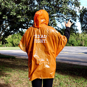 Burnt Orange Poncho with "Texas! Fight!" on the back
